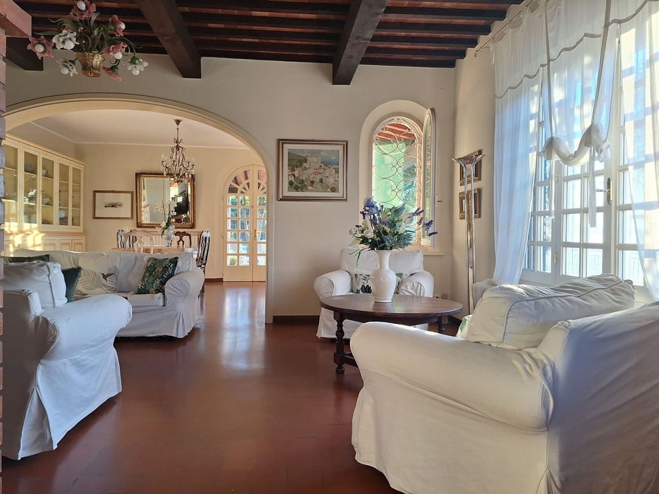Furniture, Interior Design, Flooring, Couch, Floor, Ceiling, Wood, Living Room, Table, Lighting
