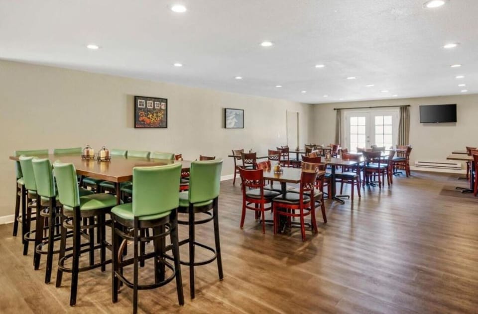 Gather for coffee and conversation in a spacious breakfast area.