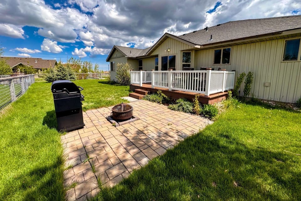 Head to the backyard to grill up a meal or enjoy the propane fire pit.