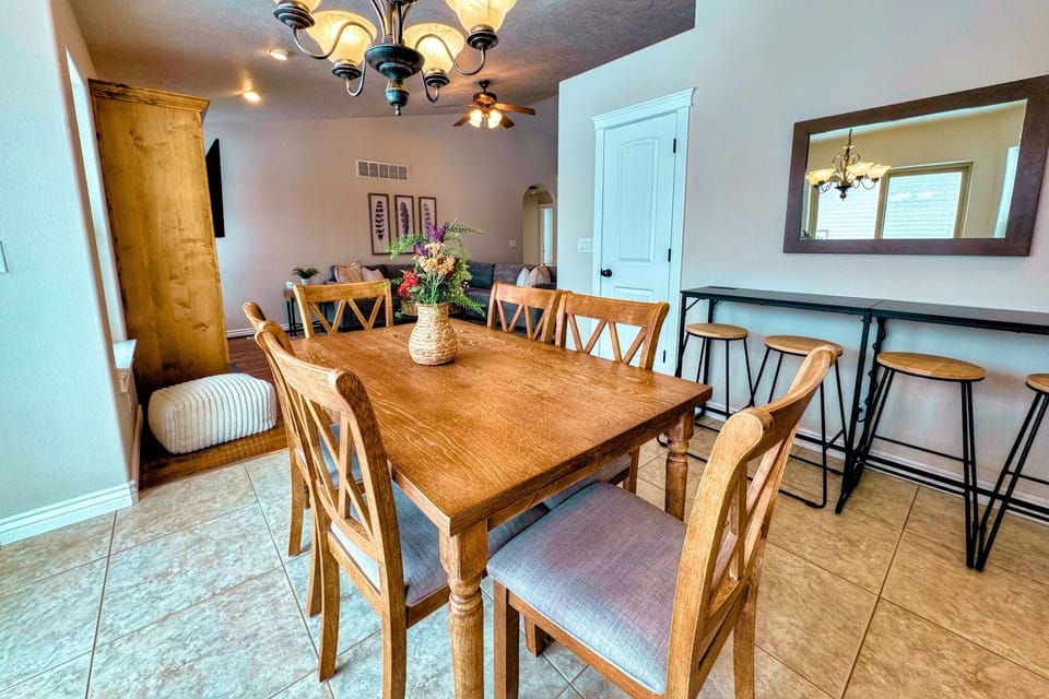 Gather around the dining table for conversation, food, and fun.