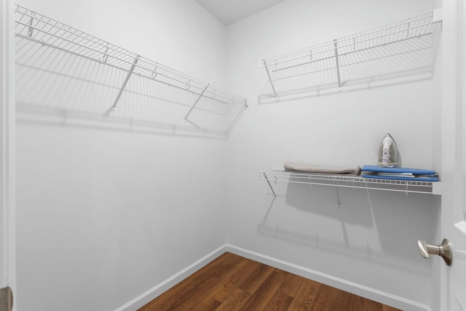 Primary bedroom's walk-in closet.