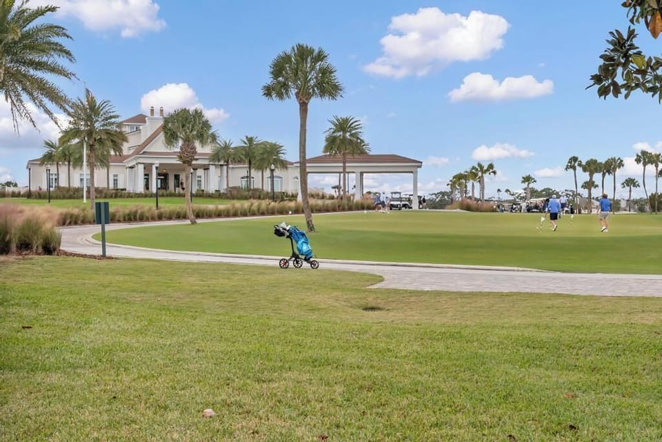 Open green space nearby, perfect for a stroll or enjoying the sunshine.