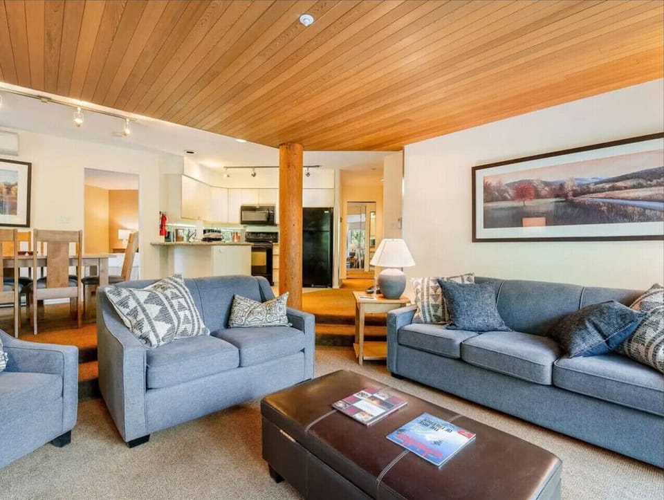 Our inviting living room offers space, comfort, and mountain views—perfect for a bowl of popcorn, a show, and an evening of pure relaxation.