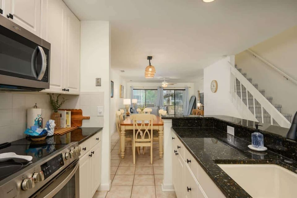 Open-concept view from the kitchen through to the living area.