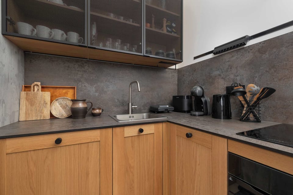 Cook and dine in style with the modern kitchenette and dining area.