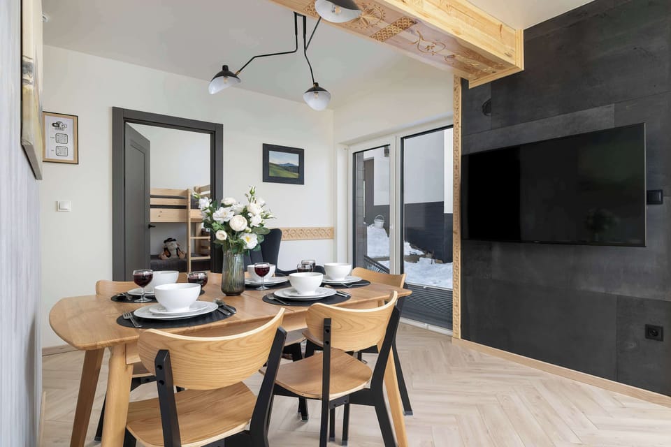 The living room's sleek design is both functional and aesthetically pleasing.