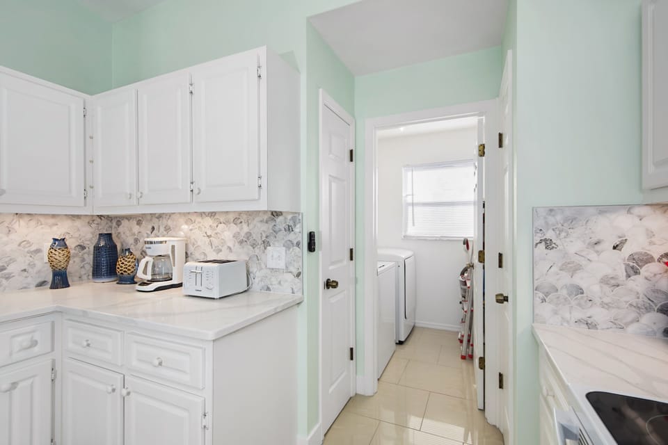 Laundry room is off of kitchen