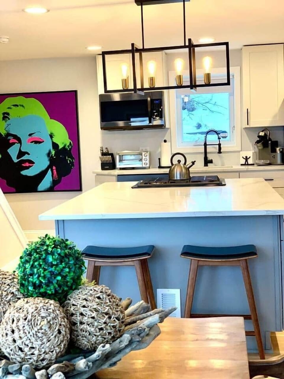 The chef has the best view in the house and will love this well stocked kitchen!