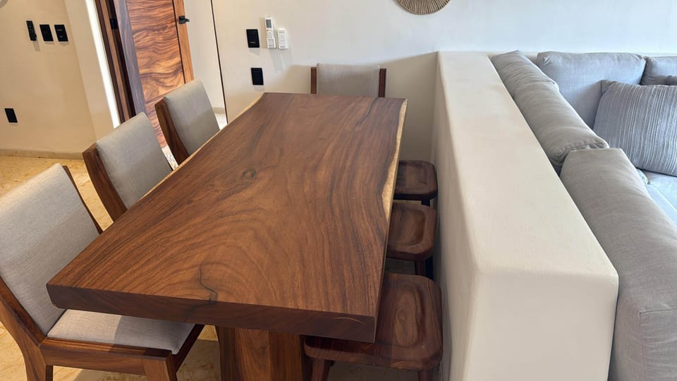 Dining table movable to seat 7 people