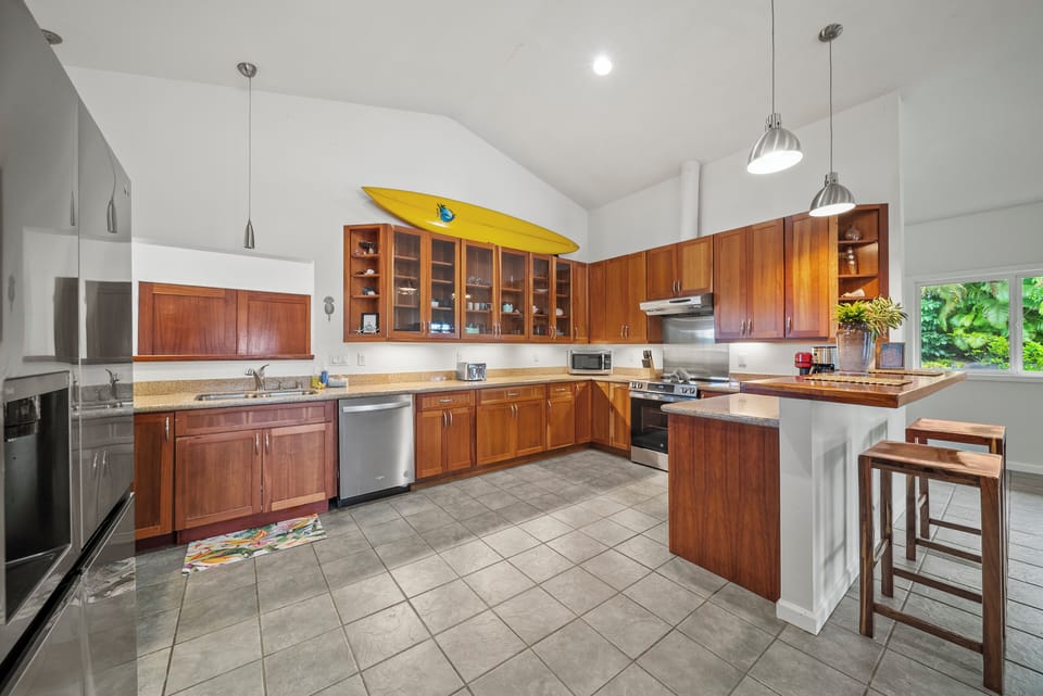 Indoor dining area adjacent to kitchen, ideal for gathering with family or friends.