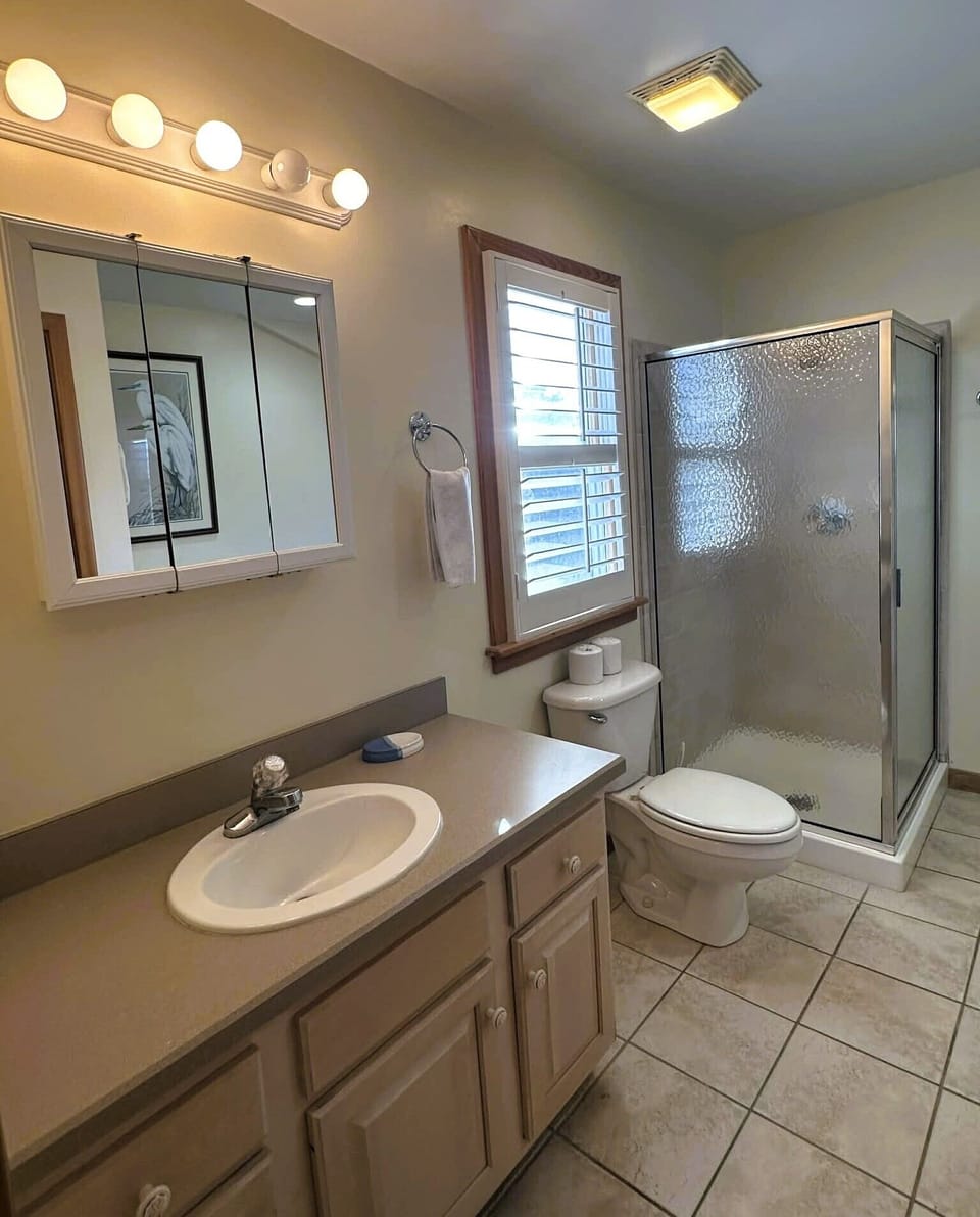 Bathroom with whirlpool tub & shower 