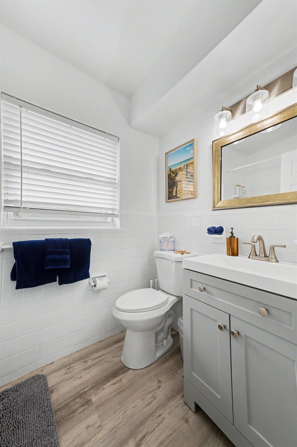 Freshen up in your bright, sparkling bathroom with coastal touches and modern comforts—everything you need to feel at home.