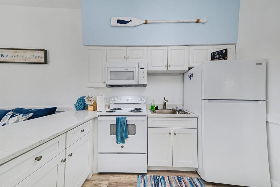 Bright Kitchen & Dining Space with Coastal Decor