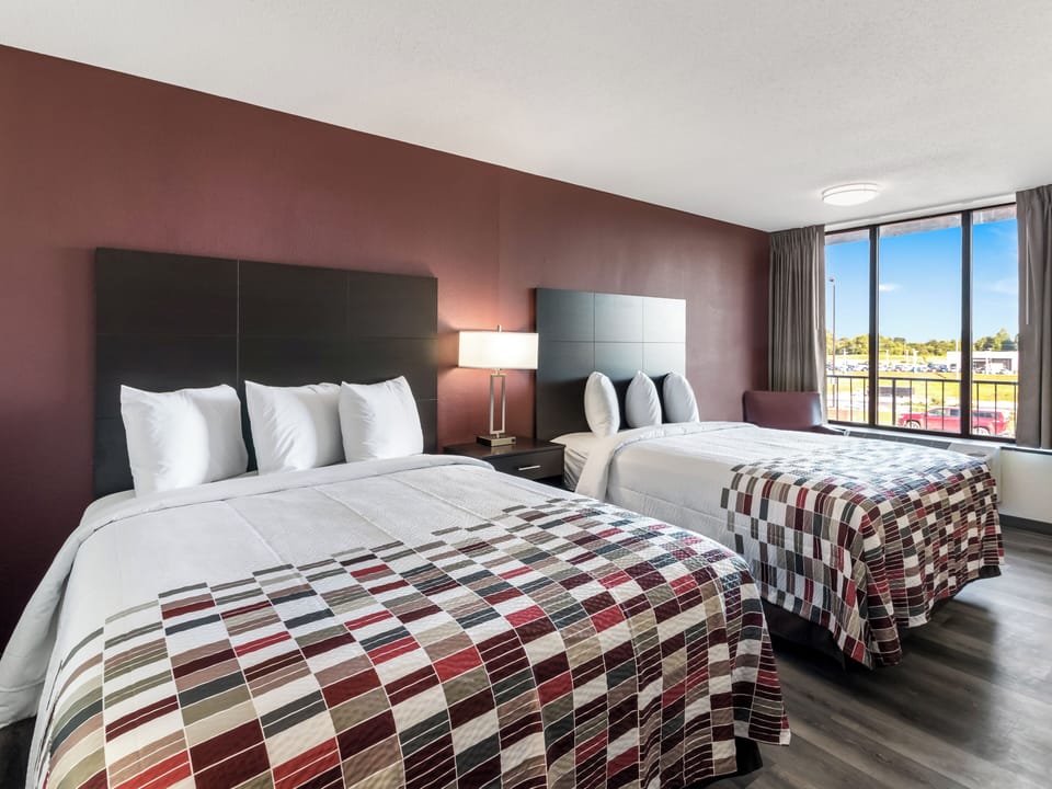 Settle into crisp linens with sunlight pouring through windows.