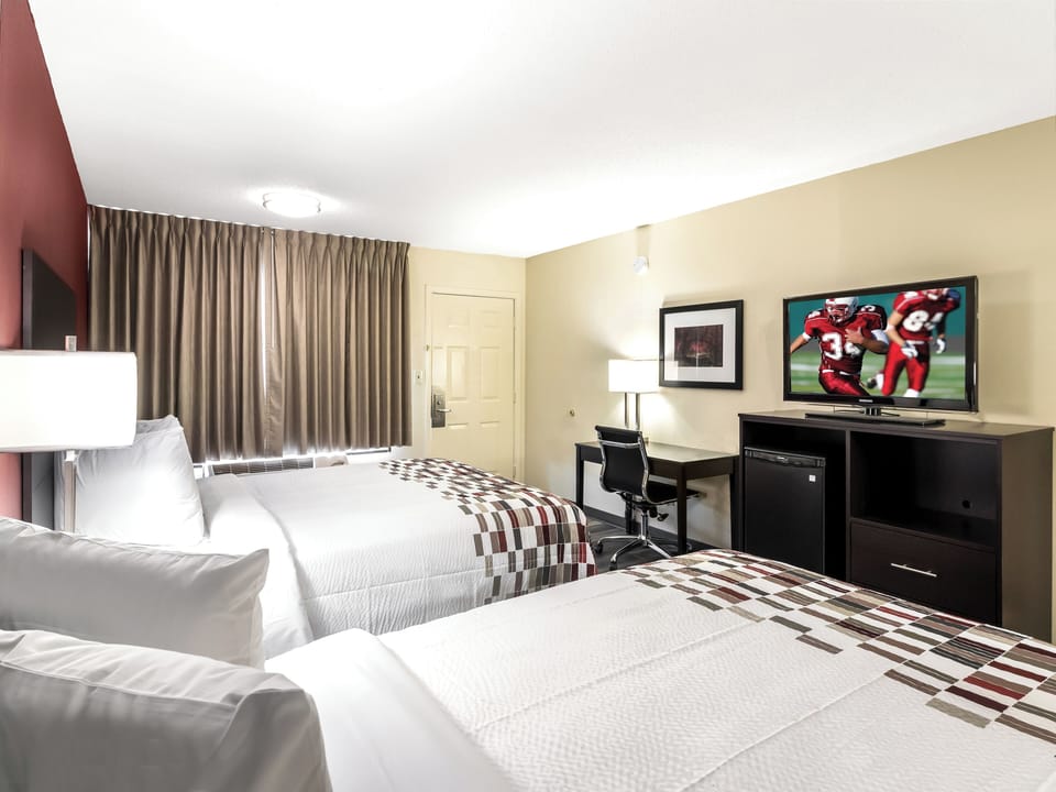 Enjoy movie nights from bed with convenient in-room entertainment.