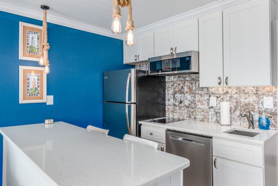 Kitchen with Range, Dishwasher, Fridge/Freezer, and Microwave