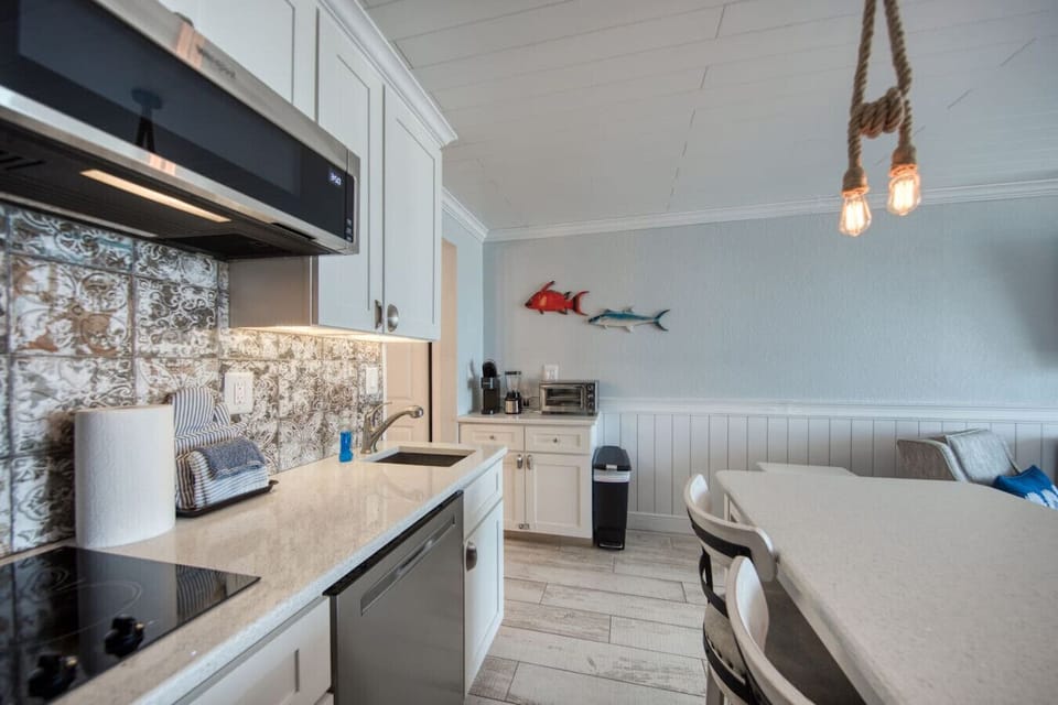 Keurig, Blender, and Toaster Oven which now has Hanging Shelves above them