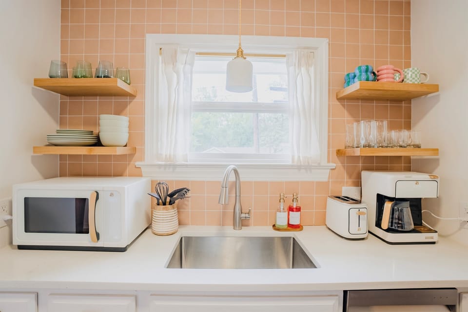 Fully Stocked Kitchen With Coffee Pot