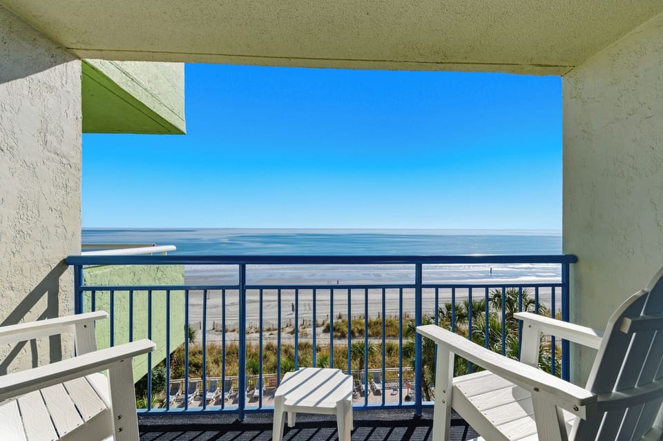 Relax in comfortable seating while the sound of waves sets the perfect backdrop for your getaway.