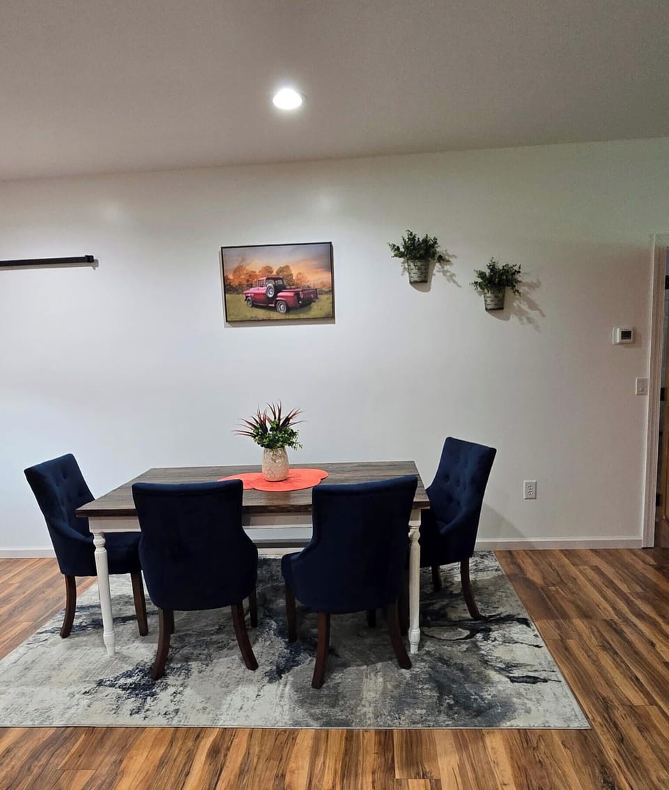 Dining table with 4 chairs and a bench seating