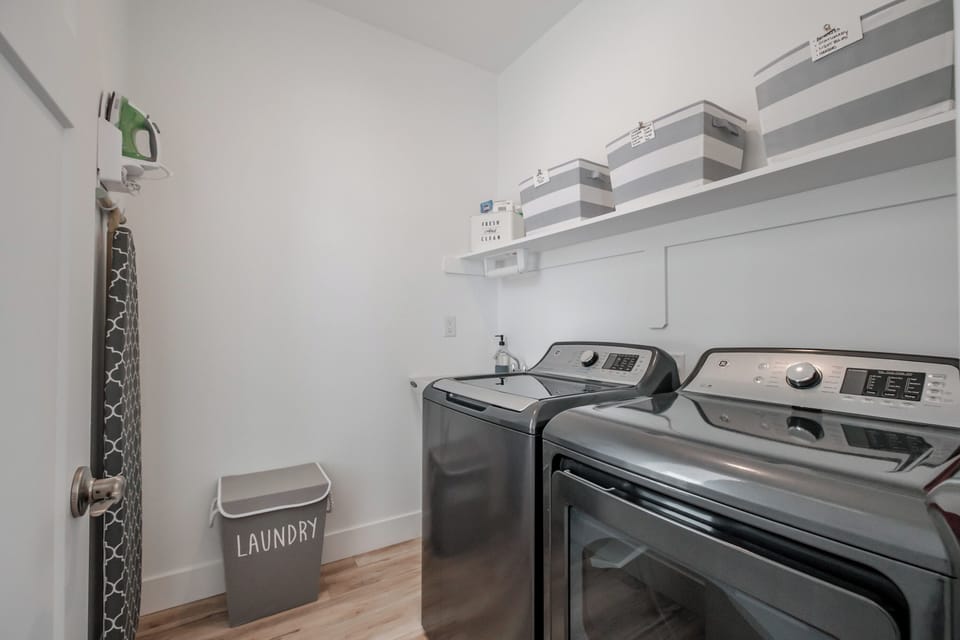 Convenient laundry amenities ensure comfort and ease during longer visits. 