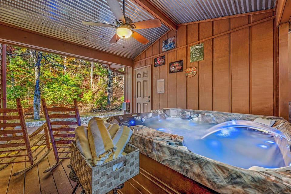 Slip into the steaming hot tub while enjoying open-air views of the forest and creek—your own private retreat that blends comfort and mountain serenity.