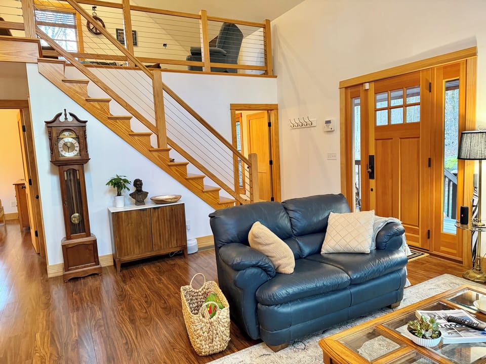 Living room with a TV, reading material and games