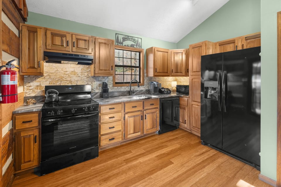 Fully stocked kitchen with coffee bar!