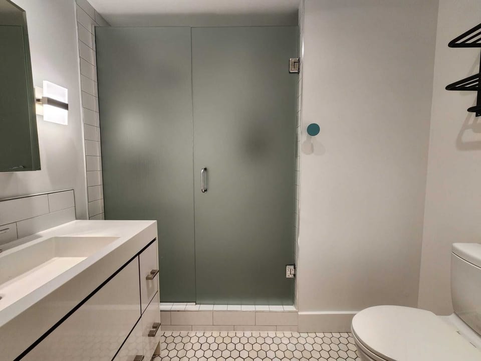 Bathroom #1: Walk in shower is full length and extends to the right.