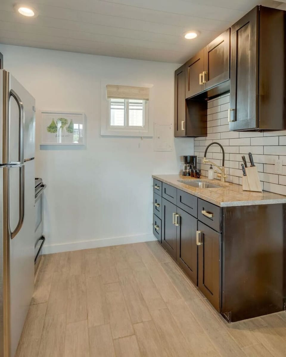 Cook, wash, and dine in a complete kitchen setup.