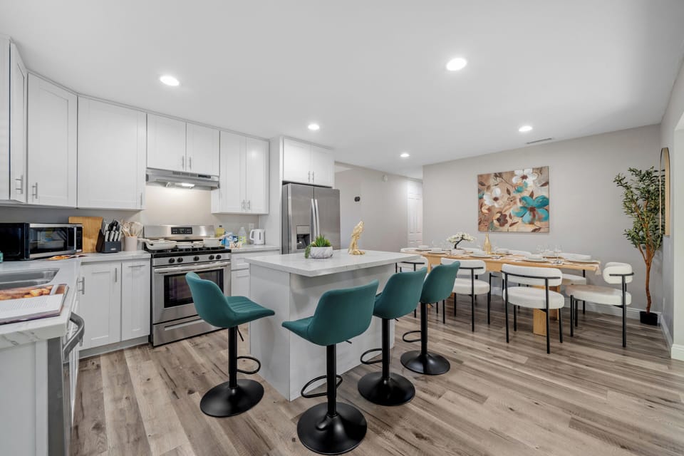 Bright kitchen island adding style and function to the space.