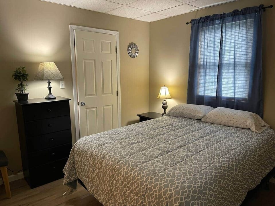 Cozy bedroom with queen size bed and large closet. 