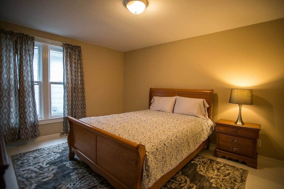 Bedroom 1 - Master bedroom with queen bed, dresser, nightstand, and large closet with shelf