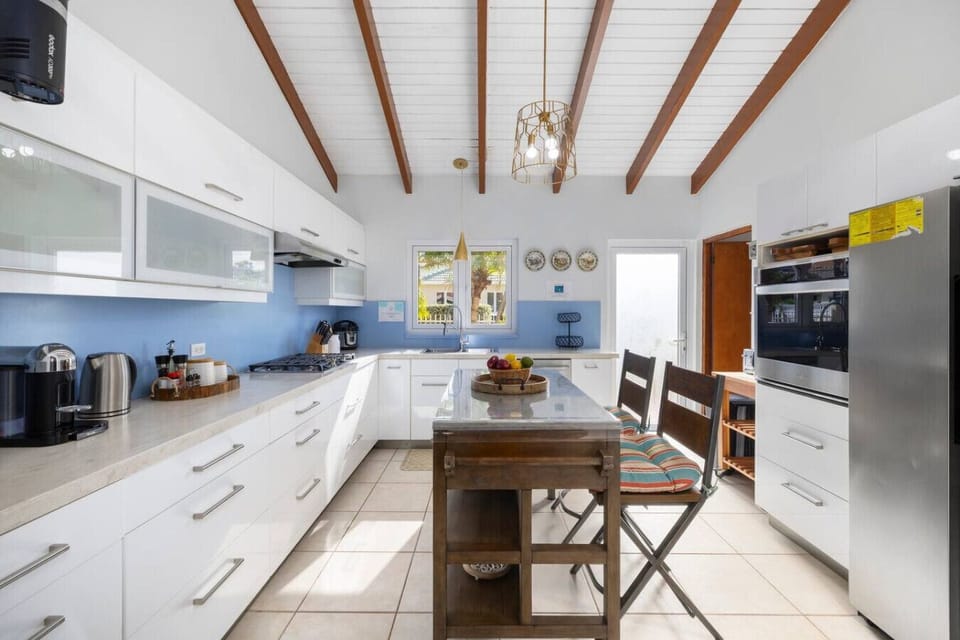 Cook up some memories in this modern kitchen! With plenty of space and natural light, it`s perfect for whipping up favorite meals and enjoying time together.