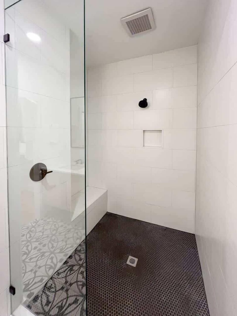 3rd Floor: Primary Bathroom featuring a dual vanity and stand-in shower.