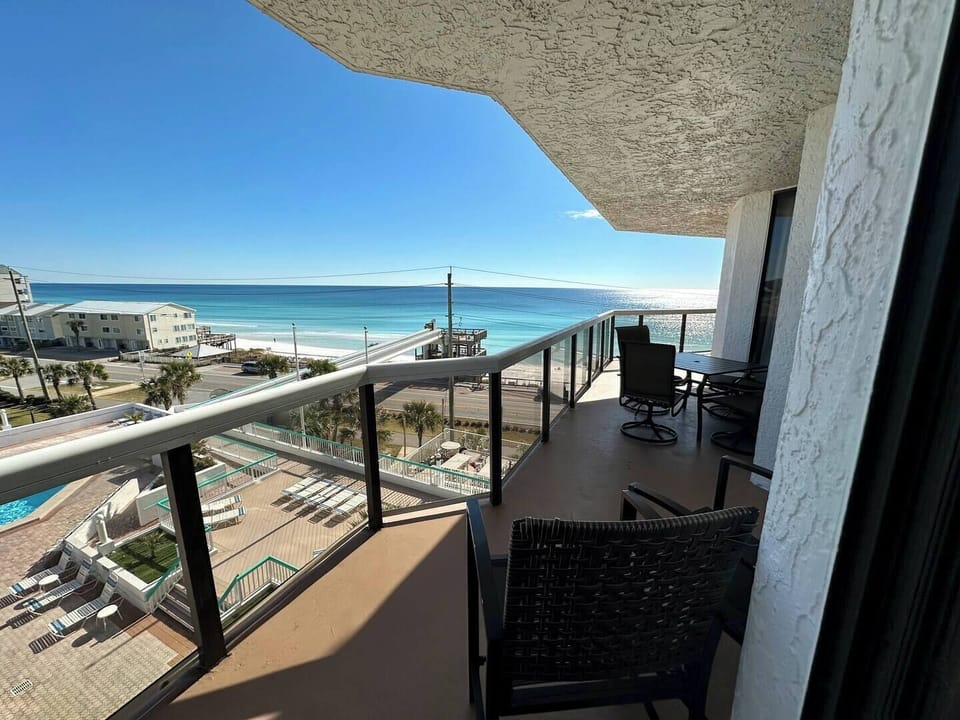 Balcony overlooking the pool deck and the Gulf of America! 