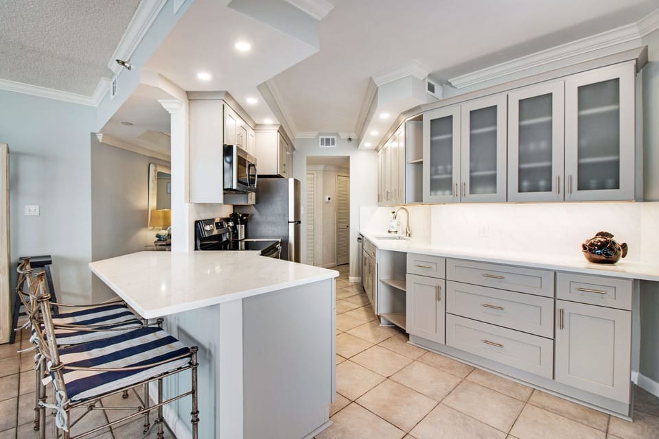 Step into a brand new kitchen with high end appliances. 