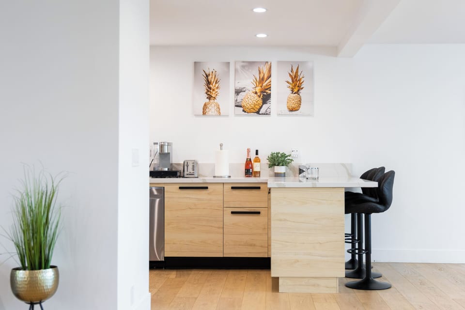 Kitchen nook with bar seating.