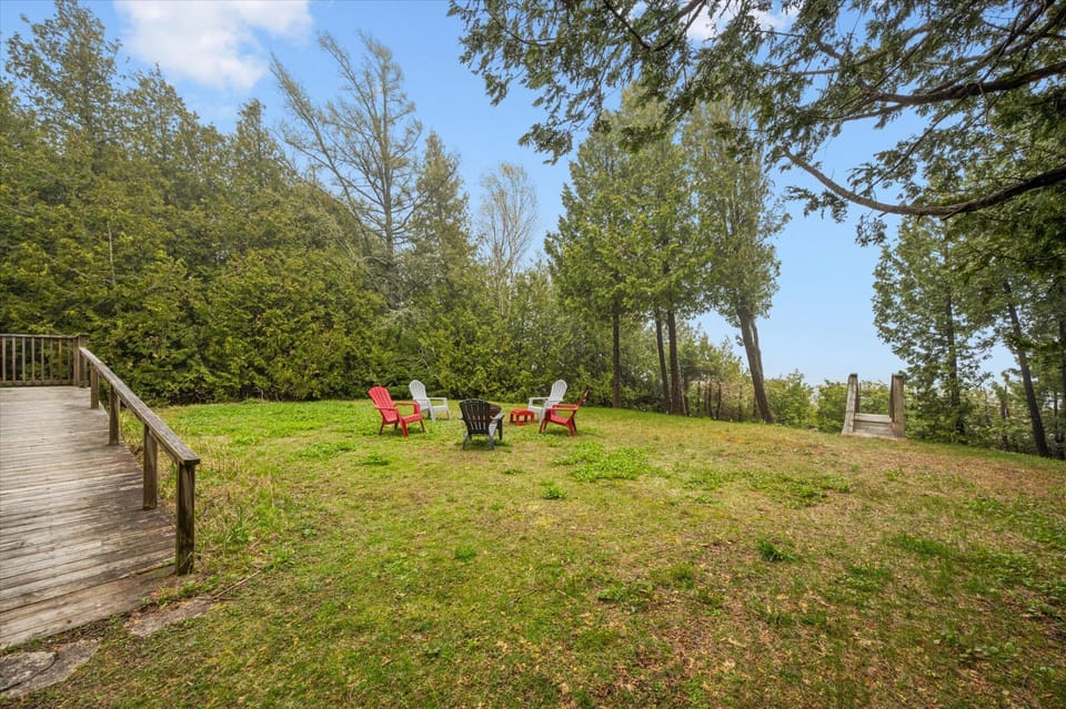 Private deck with peaceful views toward the lake—ideal for morning coffee or evening relaxation.