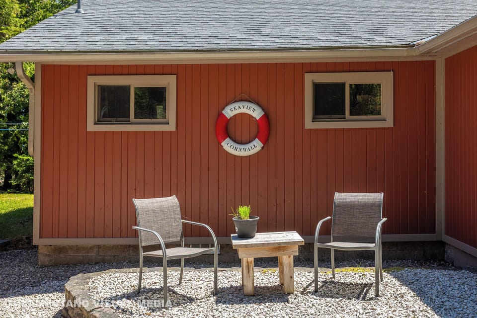 Cozy sitting area outside the cottage—an ideal spot to enjoy the fresh forest air.