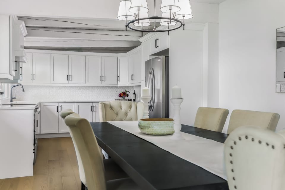 Fresh modern kitchen and dining view with plenty of room for big breakfasts and dinners.