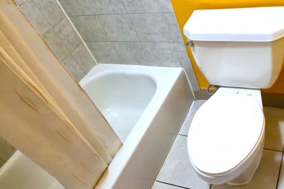 Rinse off easily with a convenient shower-and-tub combo.