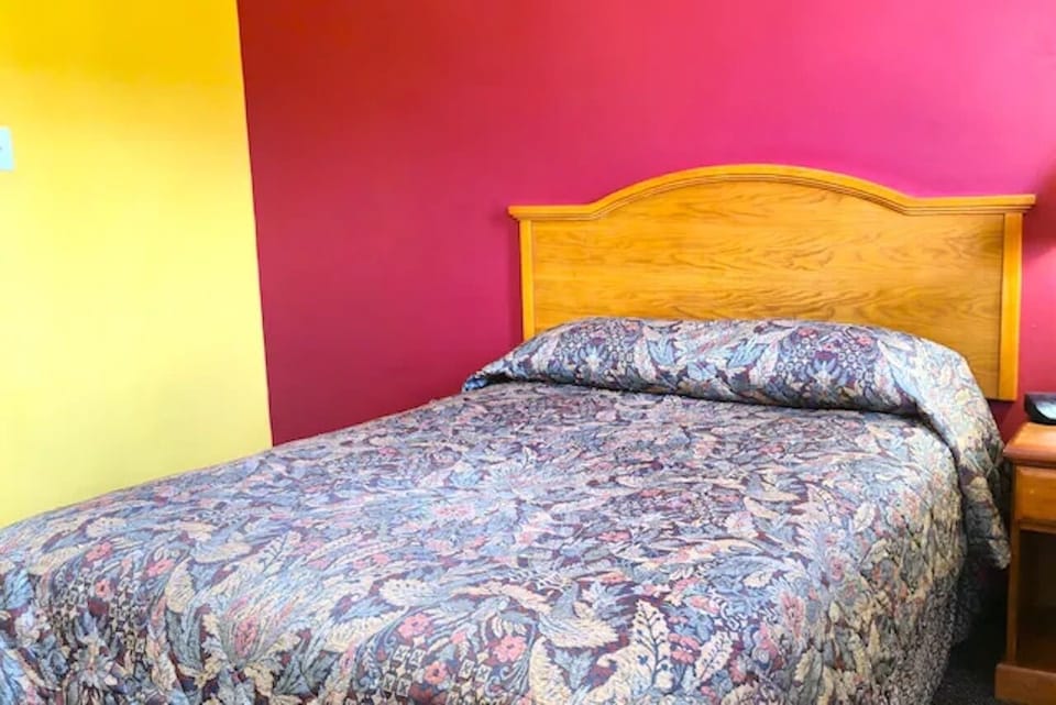 Drift off comfortably in a simple room made for rest.