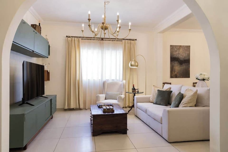 Natural light floods the open-plan living room, making it the perfect space to gather. Share stories, play games, or simply relax as a group.