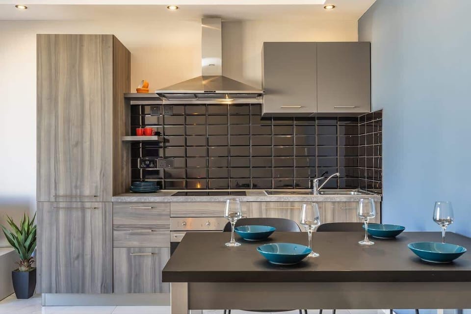 Feel right at home in the fully-equipped kitchen, complete with everything you might need during your stay. From pots and pans to utensils and appliances, this kitchen has it all. 
