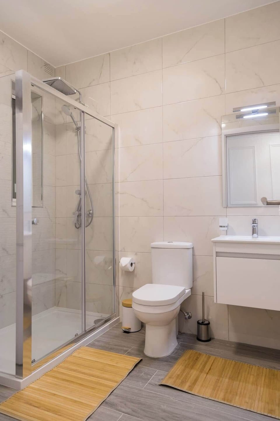 Spa-style bath 1 - rainfall shower, full vanity and eco toiletries - refresh after a beach day. Pack light - in-unit washer-dryer keeps beach towels and outfits fresh all week.
