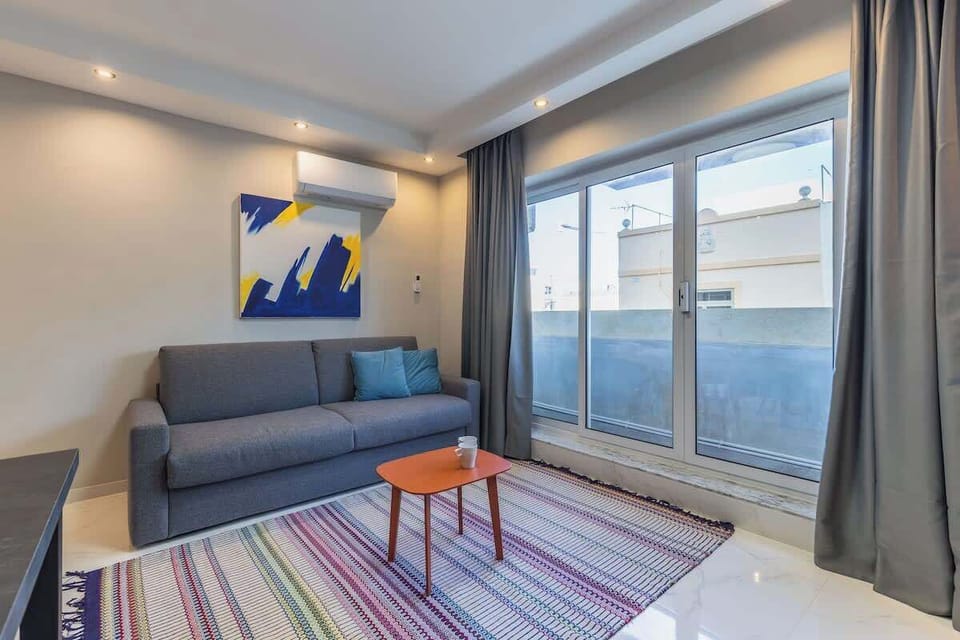 Step out onto the balcony, a serene space for a moment of peace and fresh air.