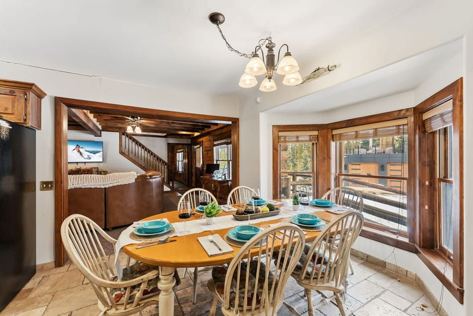 Dining area: Table seating for 5 plus nearby bar seating for 2