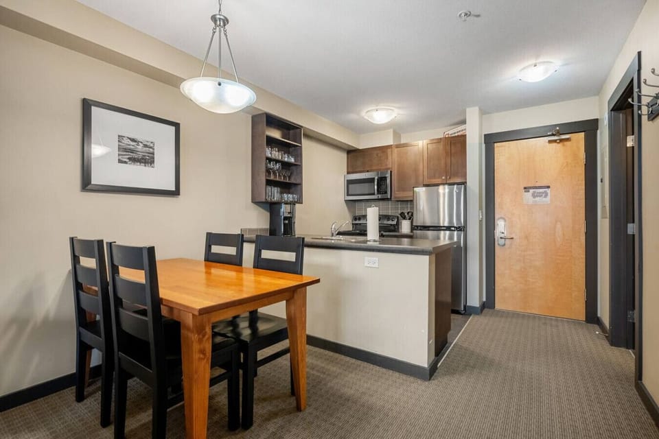 Full kitchen with a drip coffee maker, ground coffee, tea, sugar, and basic condiments (ketchup, mustard & relish.)