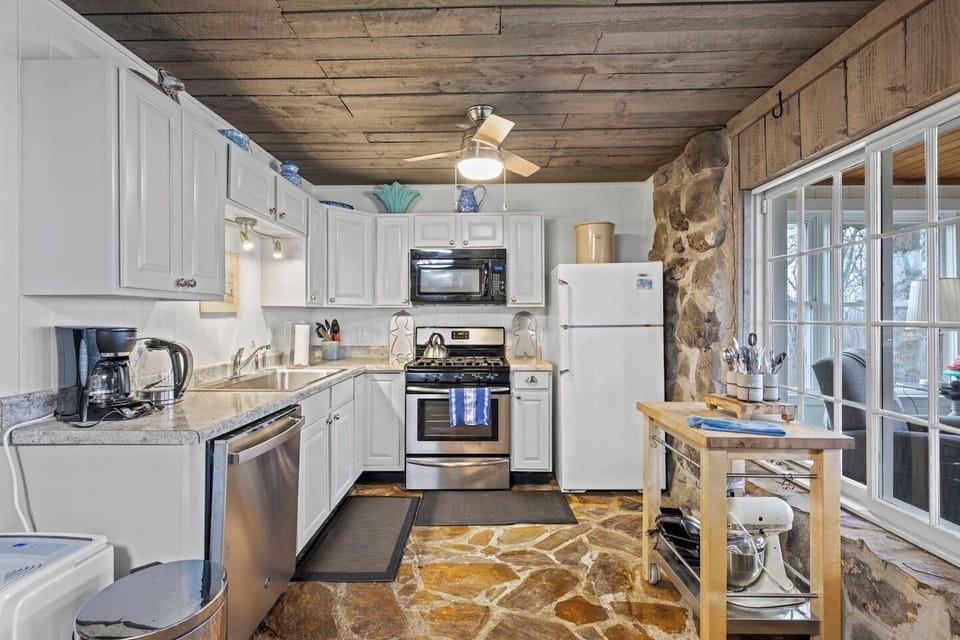 Spacious full kitchen with gas range—perfect for cooking bigger meals.